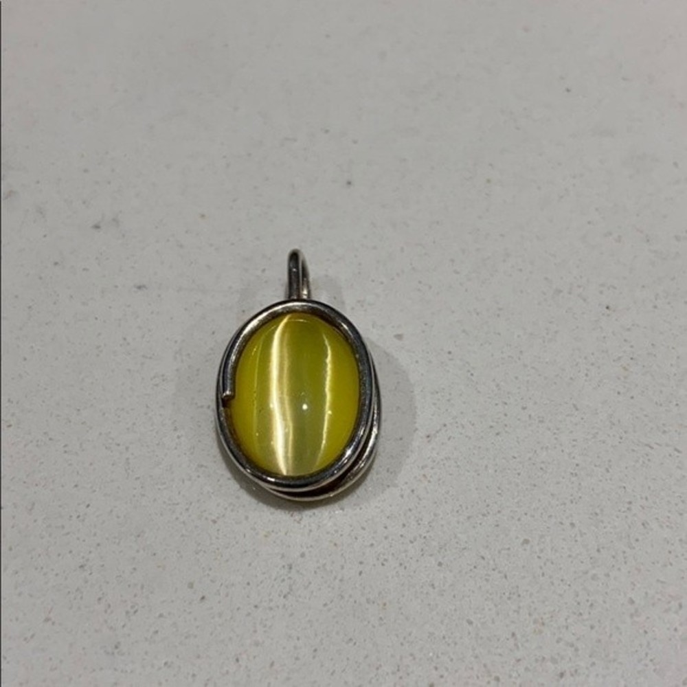 .925 silver pendant with yellow stone